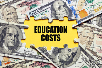 The word education costs surrounded by puzzle pieces with dollar bill money. Tuition budget or investment