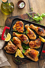 Grilled chicken thighs and drumsticks with honey glaze