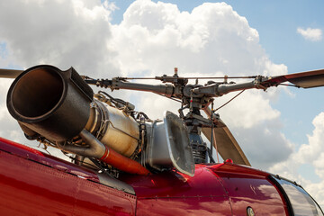 Fragment of a helicopter. Helicopter propeller against a cloudy sky. Helicopter propeller. Part of...