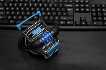 Shopping cart with combination lock, computer keyboard on background. Online shopping security.