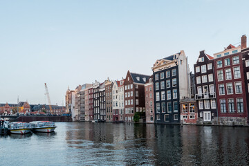the contrast of amsterdam with its old and modern buildings