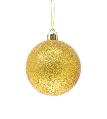 Hanging golden glitter Christmas bauble isolated on white background.
