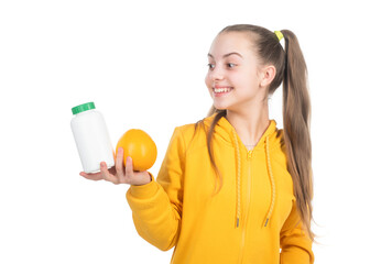 happy child choose between orange fruit and vitamin pill isolated on white, effervescent tablet.