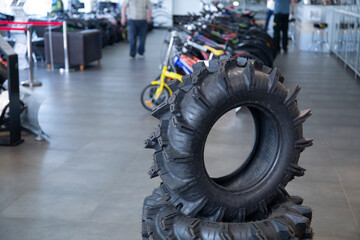 ATV in the store.Sale and repair of motorcycles and bicycles.