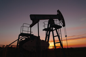 Fototapeta na wymiar Oil rocking chair at sunset like in the Arab Emirates.