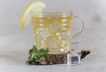 Traditional iced tea with lemon and mint.