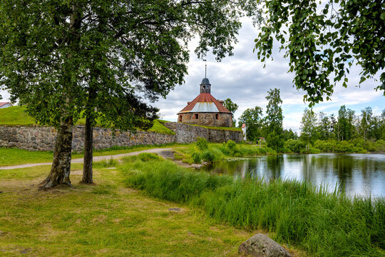 The ancient stone walls and the corner tower of the Korela (Kexholm) fortress on the banks of the Vuoksa river are the main attraction of Priozersk, Leningrad region, Russia