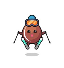 Fototapeta na wymiar chocolate drop mascot character as a ski player