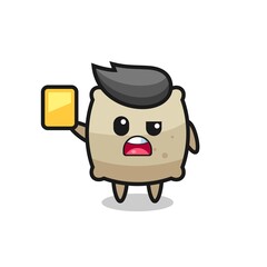 Fototapeta premium cartoon sack character as a football referee giving a yellow card