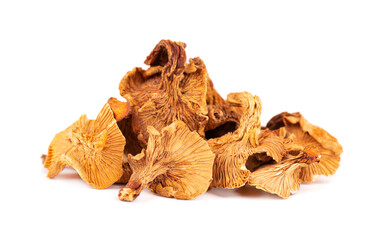 Dried chanterelle mushrooms, isolated on white background. Dried forest chanterelle mushrooms. Cantharellus cibarius. Close up.