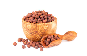 Pile of brown chickpeas in olive bowl and scoop, isolated on white background. Brown chickpea....