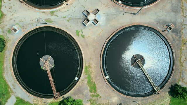Wastewater treatment plant. Flight along the treatment plant. Drone video. 4k stock footage.