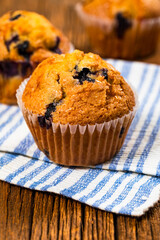 Muffins with Blueberries and Fresh Blueberries. Selective focus.