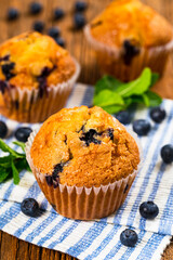 Muffins with Blueberries and Fresh Blueberries. Selective focus.