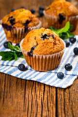 Muffins with Blueberries and Fresh Blueberries. Selective focus.