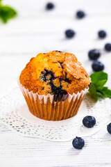 Muffins with Blueberries and Fresh Blueberries. Selective focus.