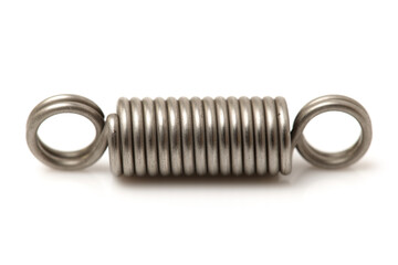Close up metal spring isolated on white background