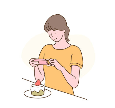 A woman is taking pictures of a cake with her cell phone. hand drawn style vector design illustrations. 