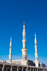 Fototapeta na wymiar Exterior view of minarets of a mosque taken off the compound.
