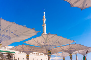 giant canopies at Masjid Nabawi (Mosque) compound in Medina, Kingdom of Saudi Arabia. Nabawi mosque...