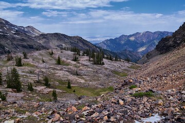 Rocky Mountains Sundial Peak at Lake Blanche hiking trail vista views in summer Wasatch Front, Big Cottonwood Canyon, Salt Lake City, Utah. United States. USA