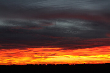 Obraz premium fire in the sky with clouds