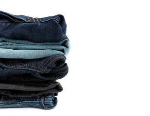 Close up of Jeans stacked on background with empty space