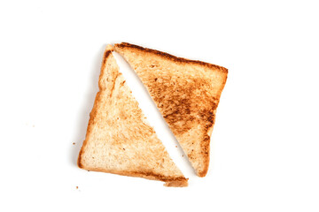 Cut in half toasted bread slice isolated on white background, top view.