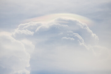 white cloud with rainbow texture and background. Cloud iridescence or irisation.