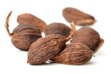 Black cardamom on a white background 