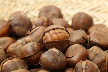 chinese food, peeled roasted chestnut on white background