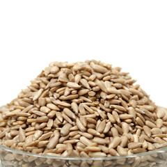 Peeled sunflower seeds pile on white background