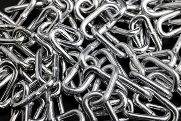 Pile of metal chains can be used as a background