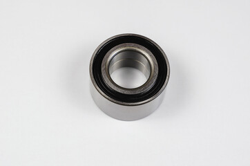 Hub bearing on white background. New Silver front hub bearing of the car. Auto parts, consumables.