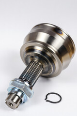Set Drive shaft joint on white background. New Constant velocity joints, hub nut and retaining...