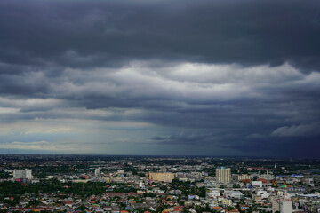 rainny cloud clover over downtown cityscapse