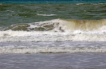 Ocean waves breaking near the shore
