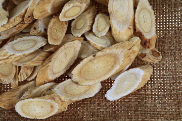 Chinese herbal medicine astragalus membranaceus on a white background