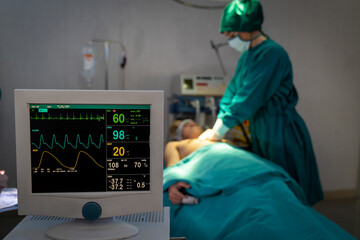 First Aid Emergency CPR on Heart Attack patient. Doctors are pumping heart of patient in the...