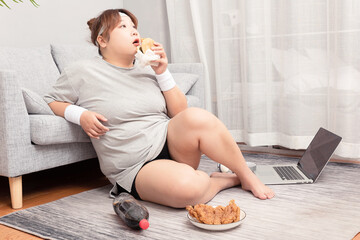 Asian fat girl sitting on the carpet