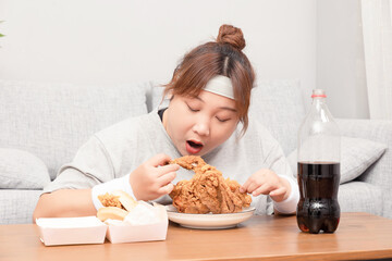 Asian fat girl drinking fried chicken