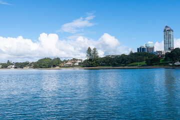 Buildings of Takapuna over bay from wharf