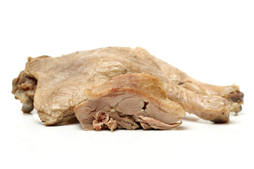 Cooked duck leg on white background 