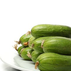Green cucumber on the white background