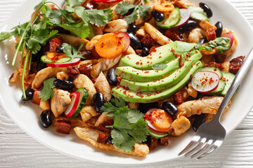 Mexican salad of black beans, chicken, and radish