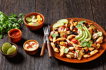 Mexican chicken salad on a plate, top view