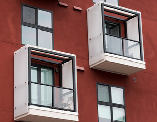 Red and white highlights of an apartment building in Gaslamp Quarter