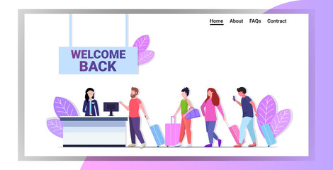 passengers standing in line queue at airport counter for check coronavirus pandemic quarantine is over