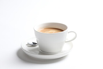 Obraz premium hot drink milk tea , milo , kopi coffee with milk in white cup and tea spoon and small plate in white background color beverage menu