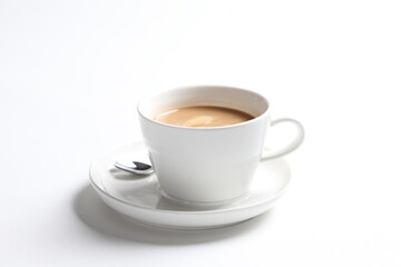 hot drink milk tea , milo , kopi coffee with milk in white cup and tea spoon and small plate in white background color beverage menu